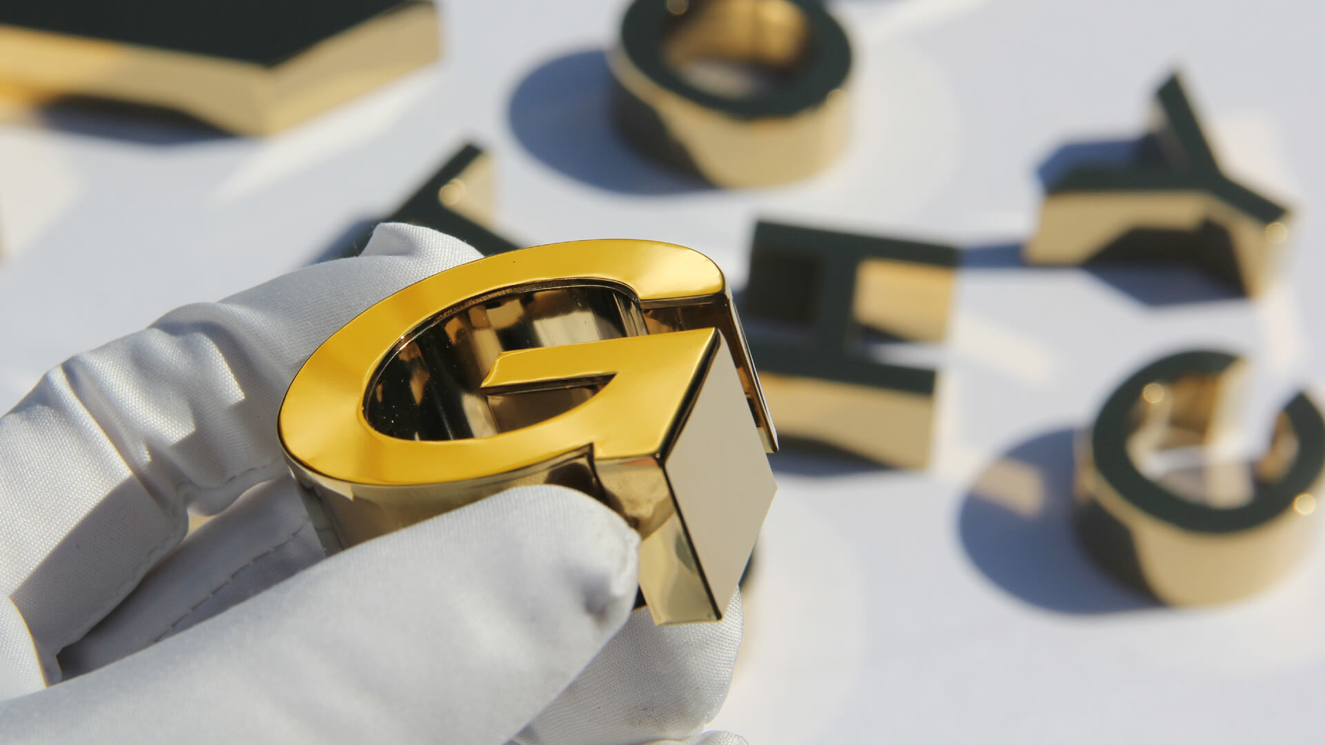 Letter G - made of stainless steel, polished in gold color