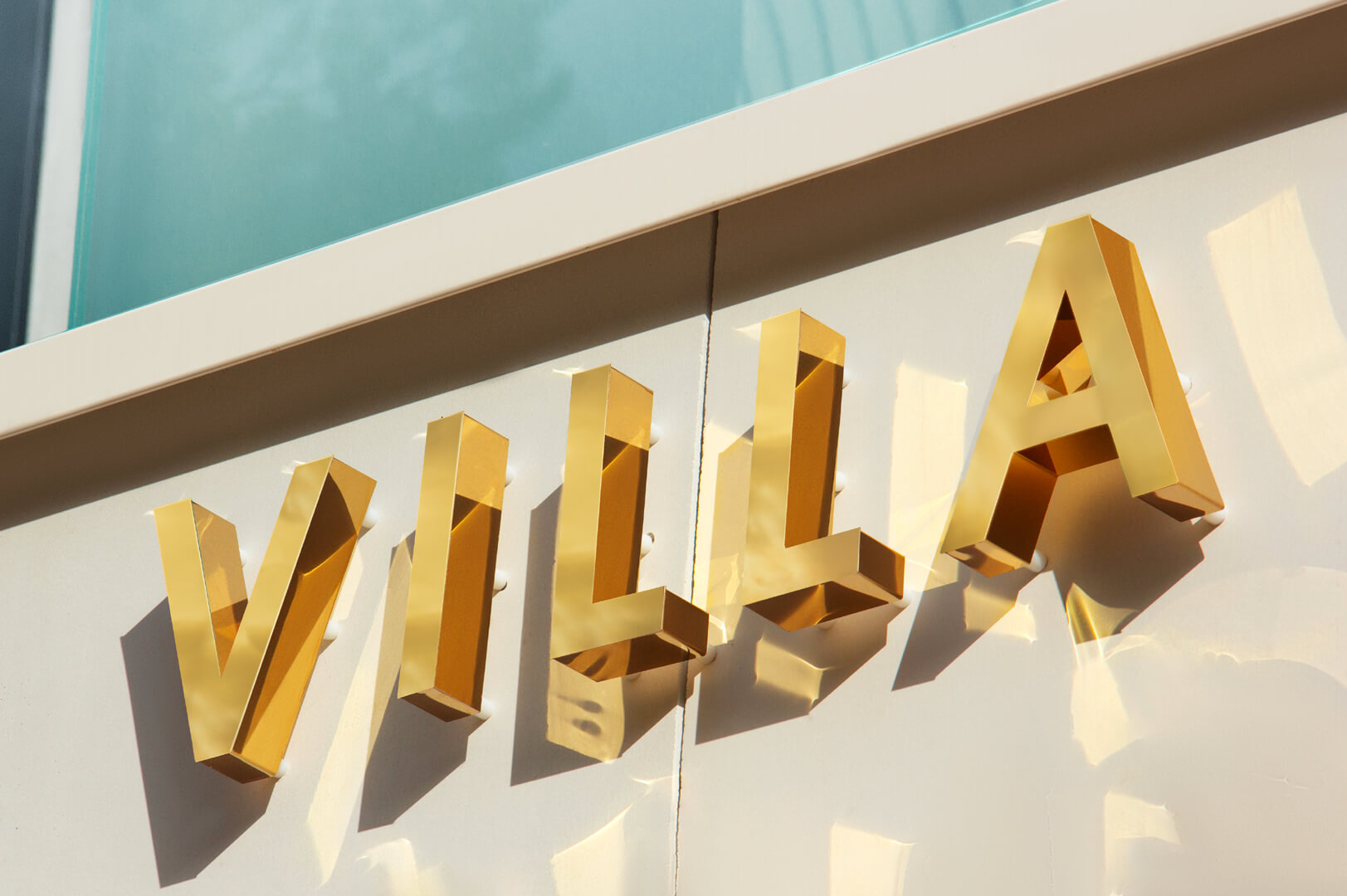 Villa Glamour - gold letters, in polished stainless steel