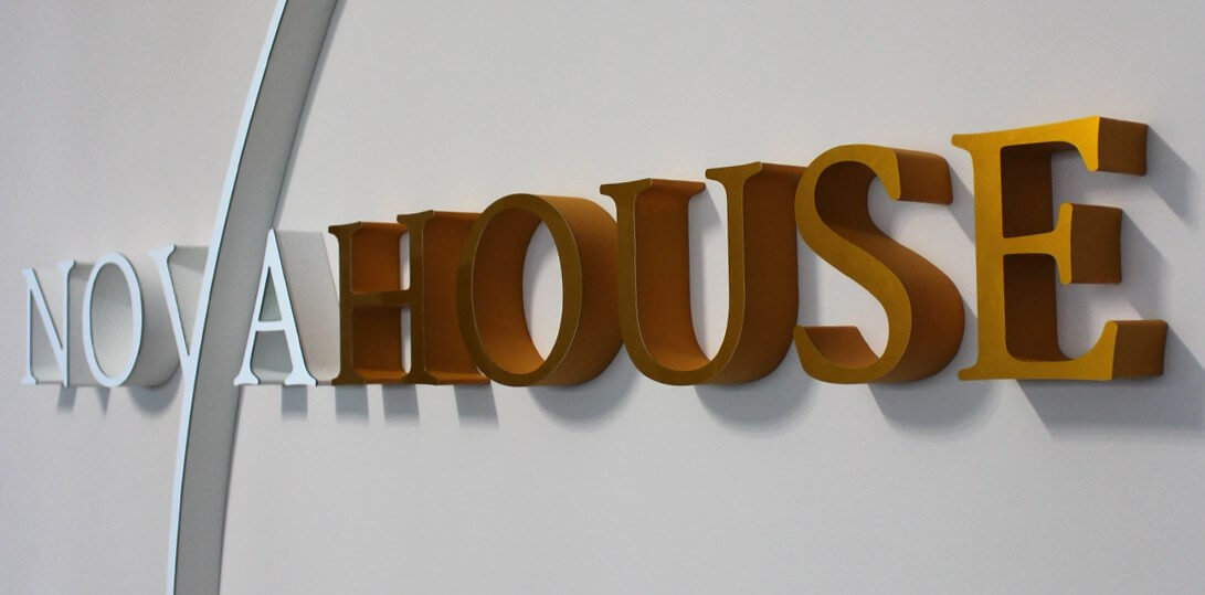 Casa Noya - noya_house; lettering_spatial_sign_with_company_name_made_of_rusted_steel