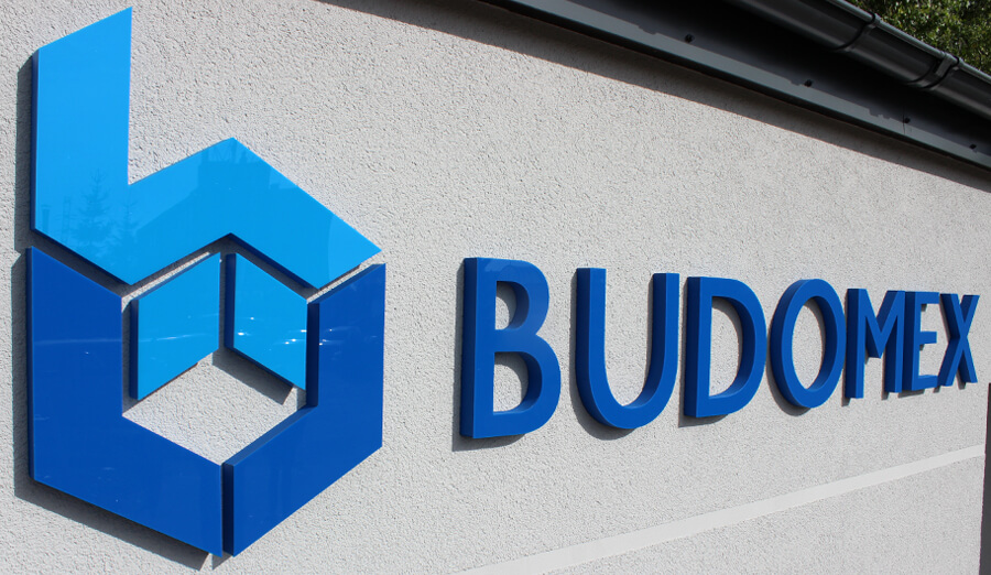 Budomex - budomex; Firmenzeichen_aus_Logos_und_Raumbuchstaben_mit_Styrodur