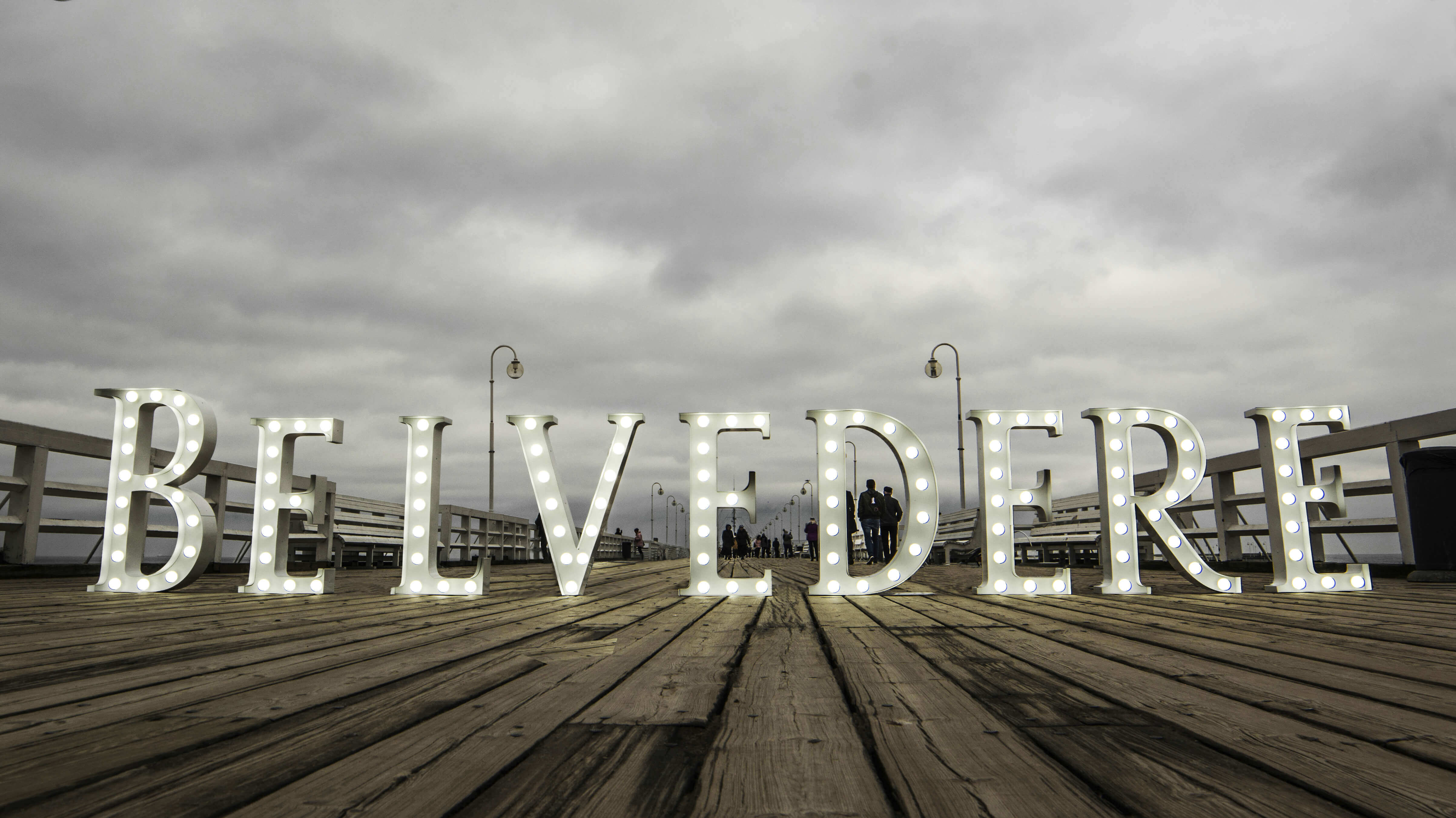 Belvedere - Belvedere - standing letters with bulbs on the pier