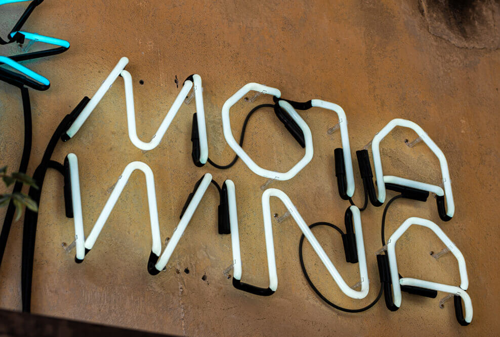 My fault - Neon sign with 'Moja wina' logo, white-blue colouring.
