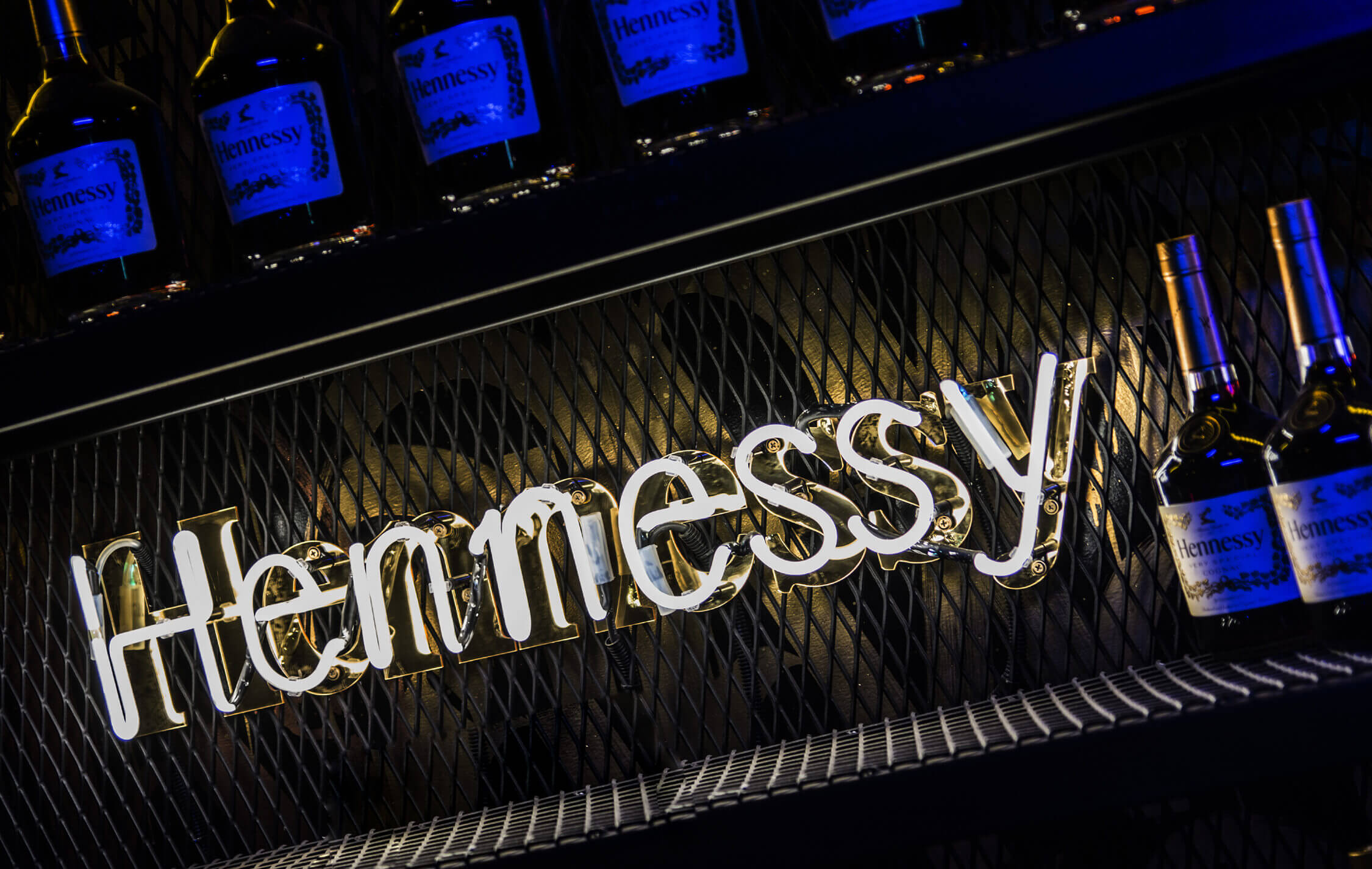 Hennessy - neon-hennessy-neon-light-behind-the-bar-neon-on-the-outside-neon-on-electrical-street-neon-on-the-corner-neon-between-bottles-neon-light-letter-neon-in-shape-of-letters-neon-order-gdansk