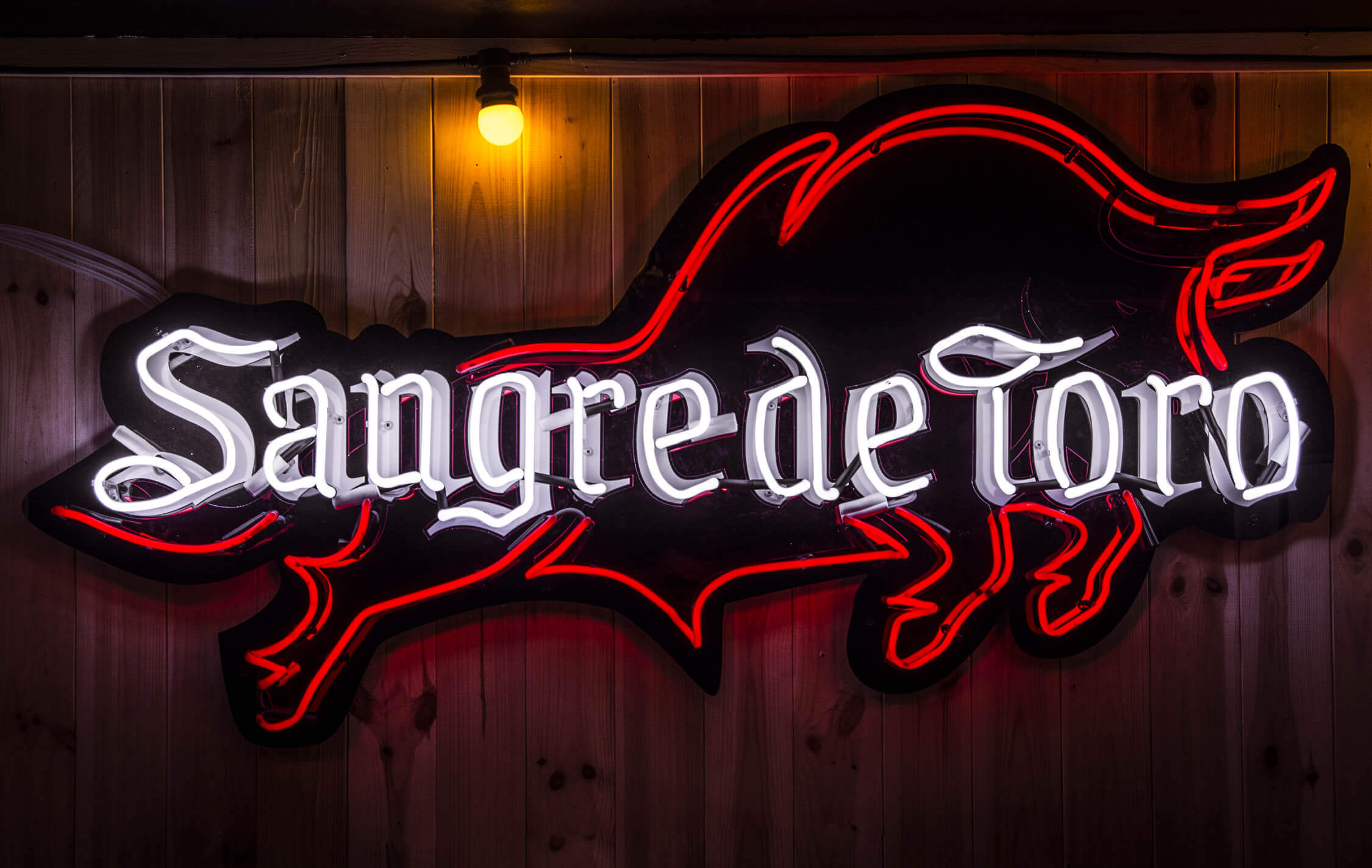 Sangre De Toro - neon-on-demand-sangre-the-torro-neon-on-a-bar-by-bar-from-neon-plexes-red-mirror-glass-tinted-in-mass-red-neon-on-electricity-desks
