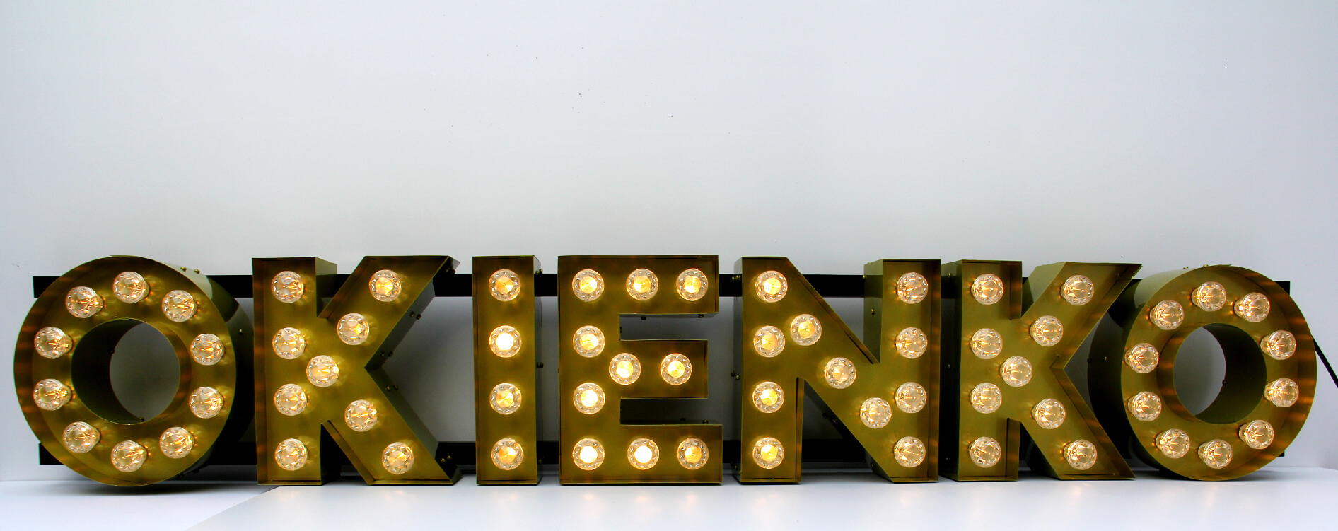 pane - Window - Letters with bulbs on the frame
