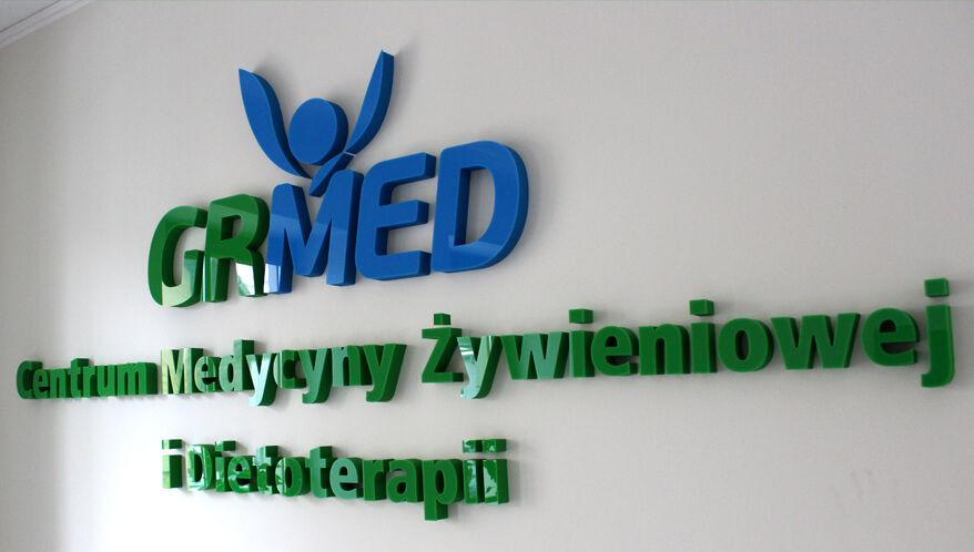 GRMED - GRMED - coloured logo made of plexiglass inside the building